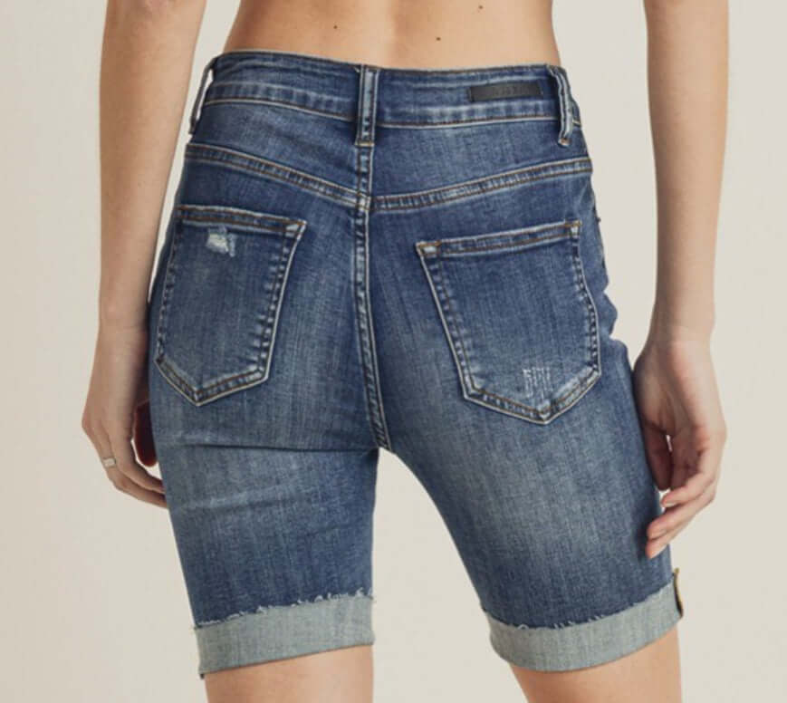 Risen Shayleigh Bermuda Shorts showcasing the back view with a cuffed hem and distressed denim look.