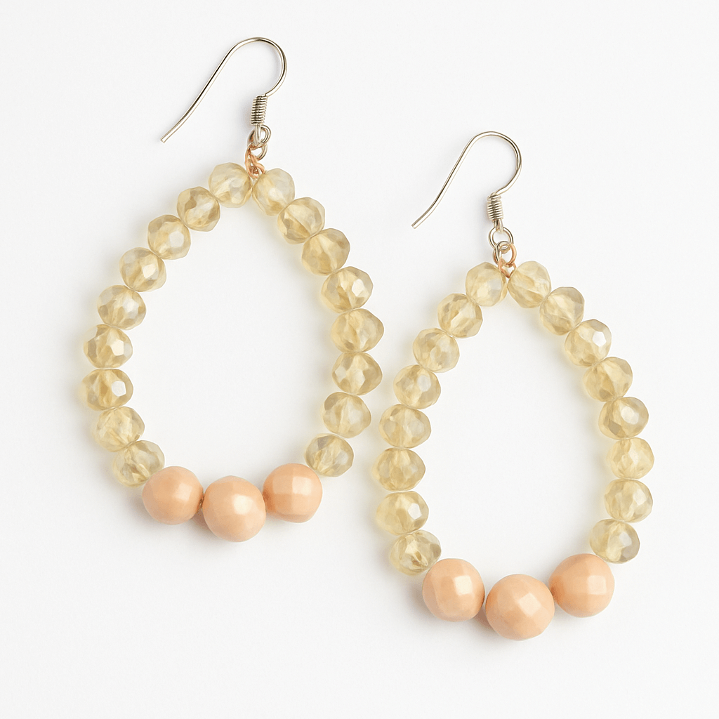 Gold-plated sterling silver beaded teardrop earrings with delicate hook design, perfect for casual or elegant occasions.