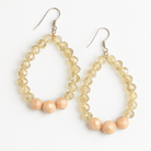 Gold-plated sterling silver beaded teardrop earrings with delicate hook design, perfect for casual or elegant occasions.