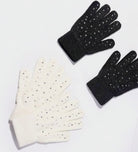 STILL BEJEWELED Gloves by Teal Tiger Boutique $4.00 Stay warm and add some glamour to your winter wardrobe with STILL BEJEWELED gloves. Choose between winter white or jet black and let the sparkly rhinestones shine on any occasion. These gloves are the pe