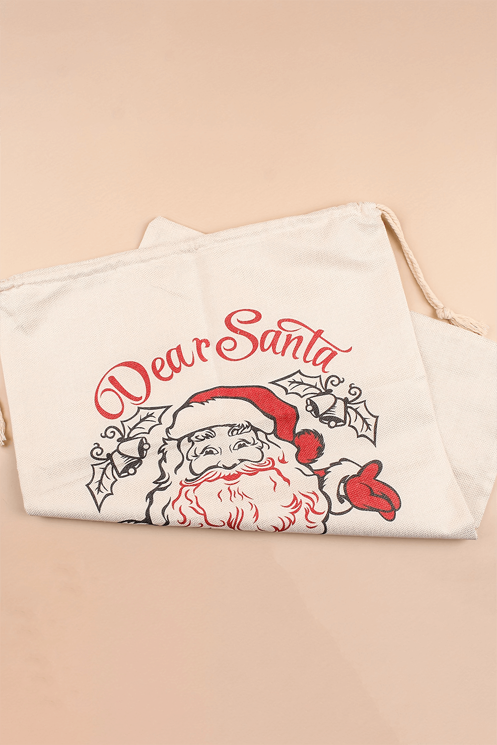 Jumbo Santa Bag with "Dear Santa" design, festive drawstring closure, durable 100% polyester, perfect for holiday gifts.