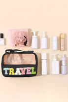 TRAVEL Bag-Black by Teal Tiger Boutique $16.00 Introducing the TRAVEL Bag, a stylish and practical accessory for all your travel needs. This super cute bag is trimmed in black and features a "Travel" on a Chennille patch, making it the perfect companion f