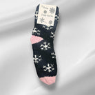 WINTER SNOWFLAKE Sherpa Socks in navy with pink accents, featuring snowflake patterns for cozy winter warmth and style.