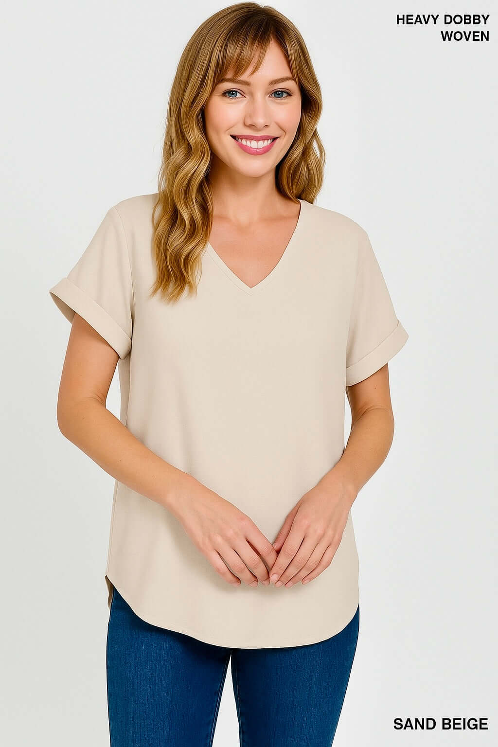 Sand beige V-neck woven blouse with rolled short sleeves and relaxed fit.