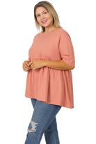 DAY OUT Top in Ash Rose- Zenana (plus) by Zenana $22.00 Indulge in the luxurious comfort of the Day Out plus size top in ash rose by Zenana . This top is made from 100% cotton and features a figure flattering baby doll empire waist style. You're sure to f