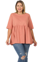 DAY OUT Top in Ash Rose- Zenana (plus) by Zenana $22.00 Indulge in the luxurious comfort of the Day Out plus size top in ash rose by Zenana . This top is made from 100% cotton and features a figure flattering baby doll empire waist style. You're sure to f