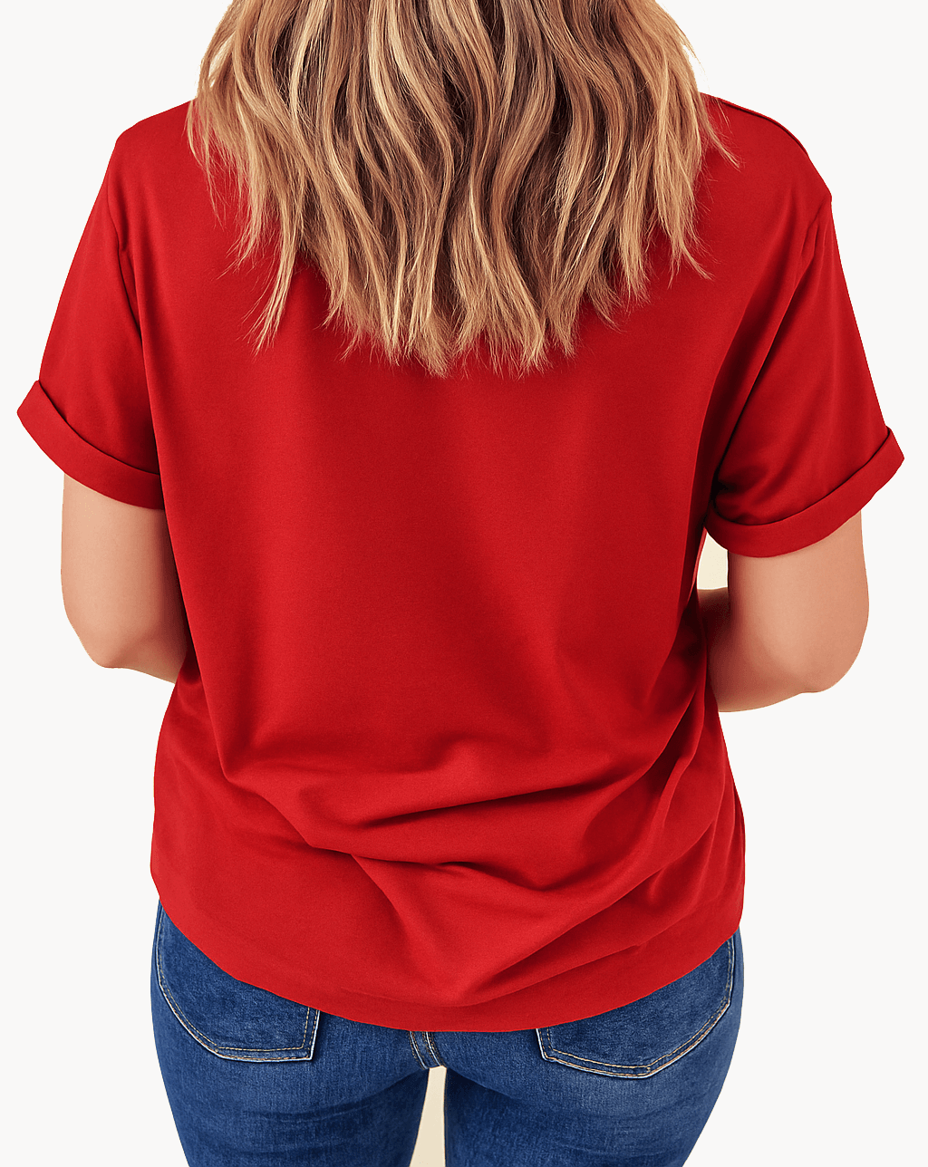 Back view of a woman wearing a red crewneck t-shirt with rolled sleeves, showcasing casual comfort and relaxed fit.