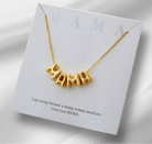 Bubbly Mama Necklace in gold tone featuring a playful 'MAMA' charm on a card with a heartfelt message.