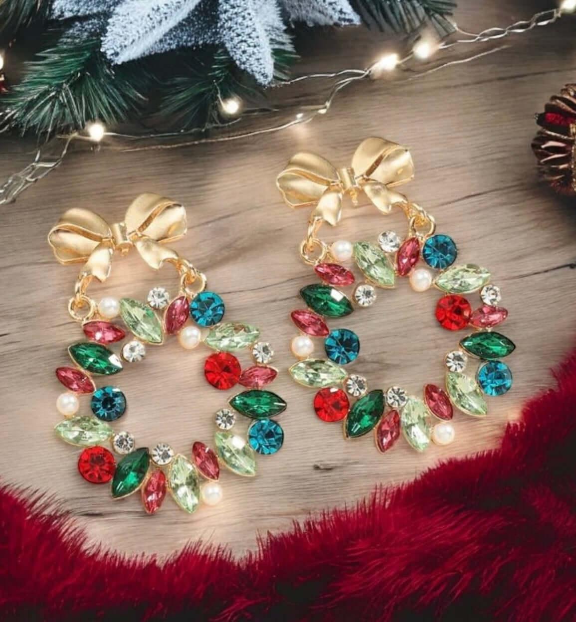 Holiday Wreath Earrings featuring colorful rhinestones and gold bows, perfect festive accessory for Christmas outfits.