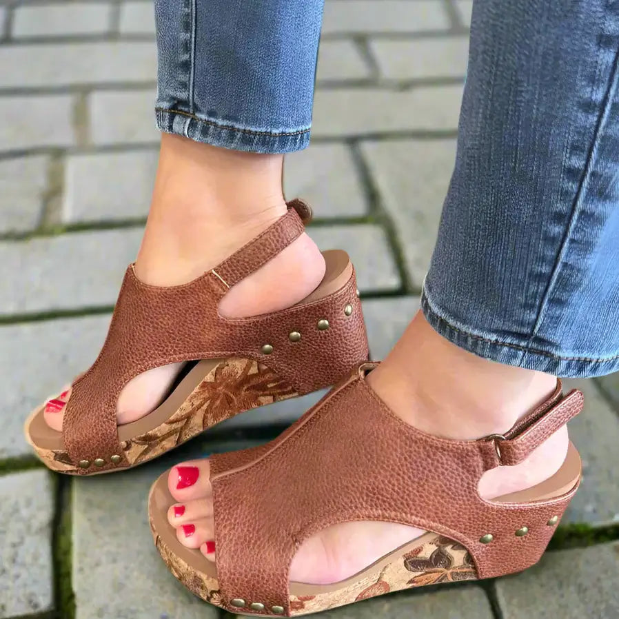 Women's Corkys Carley cognac tumbled wedge sandals, featuring a chic design and cork platform, perfect for casual outings.