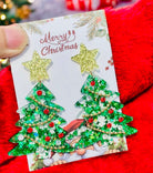 Star On Top Christmas Tree Earrings in clear green with gold star, red and white rhinestones, festive holiday accessory.