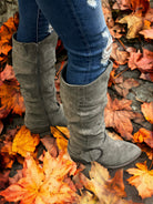 Blitz Gray Boot by Very G by Very G $45.00 Strut in style with Very G's Women's Blitz Boot in neutral gray goes with everything!! Enjoy comfy cushioning while you turn heads with every move. Don this sleek suede-esque stunner with the glossy silver buckle