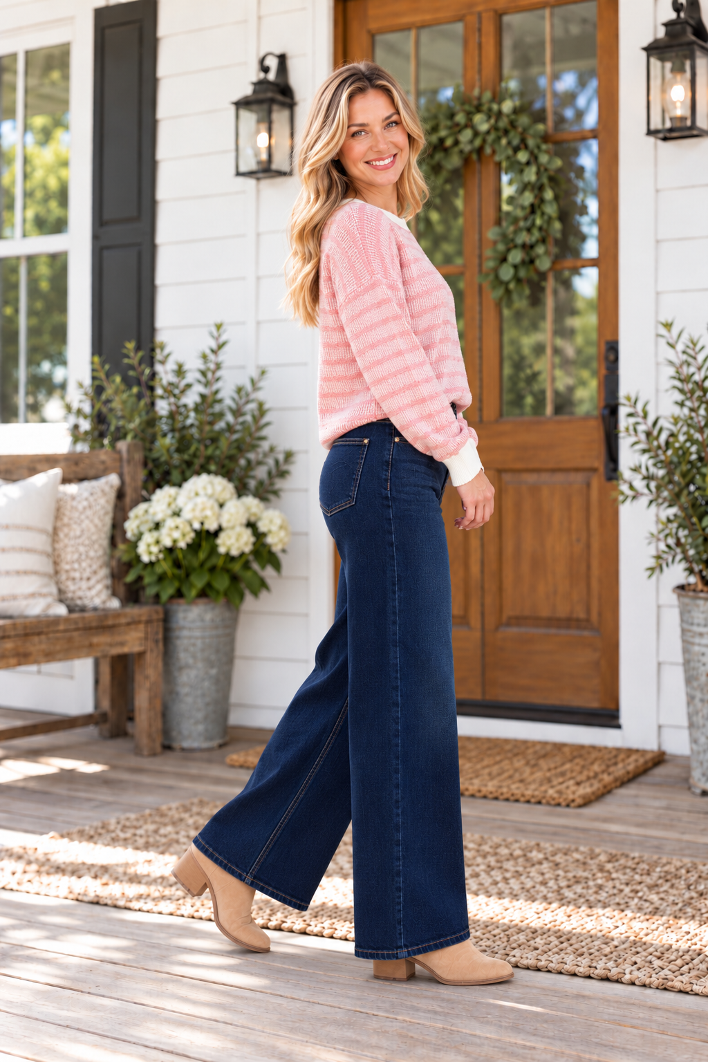 JUDY BLUE - GRACIE wide-leg jeans in Dark Twilight Blue, styled with a pink sweater and set against a cozy outdoor backdrop.