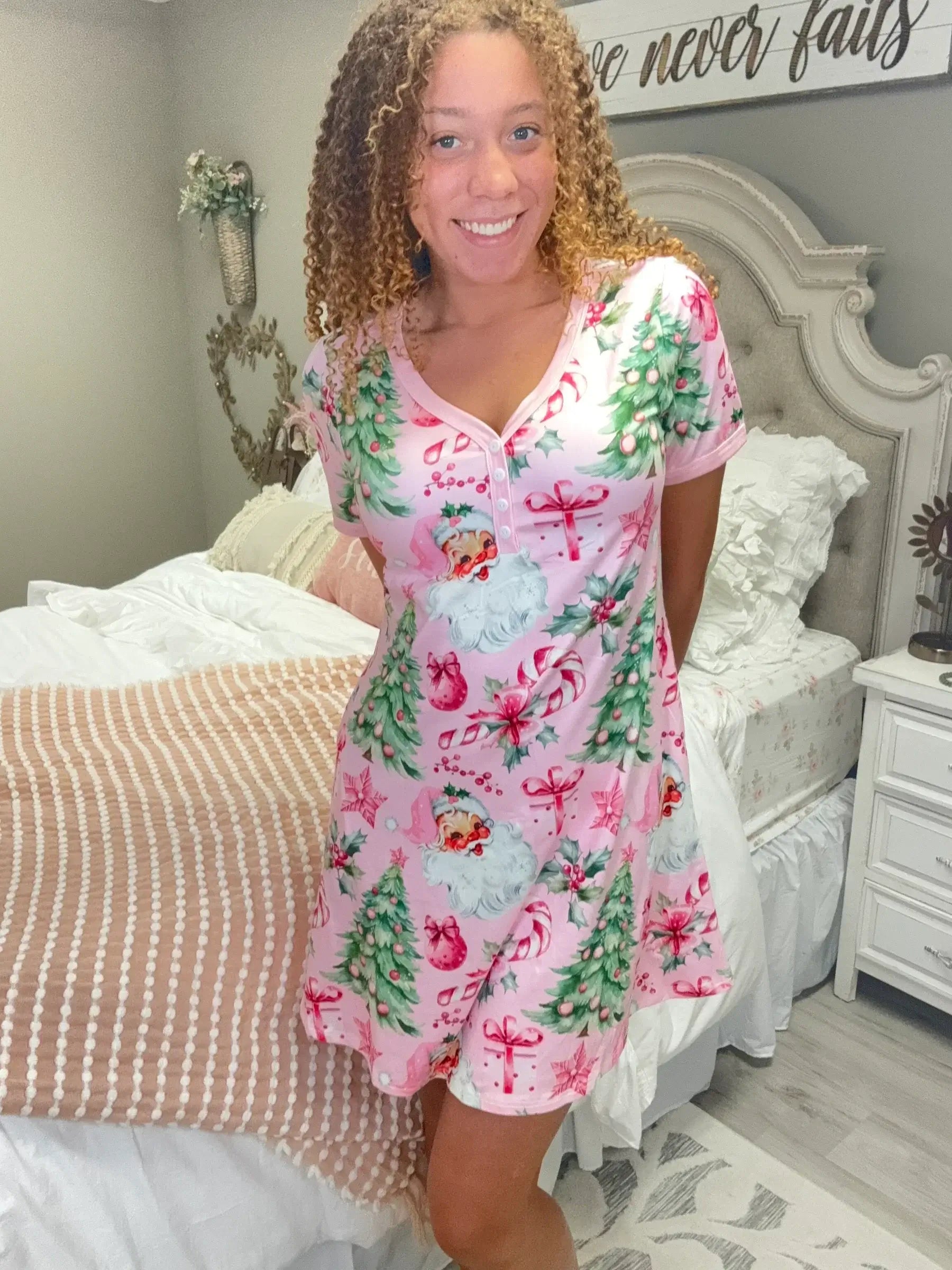 Woman wearing Shirley & Stone Cotton Candy Christmas Trees Nightgown, pink festive nightshirt in soft fabric.