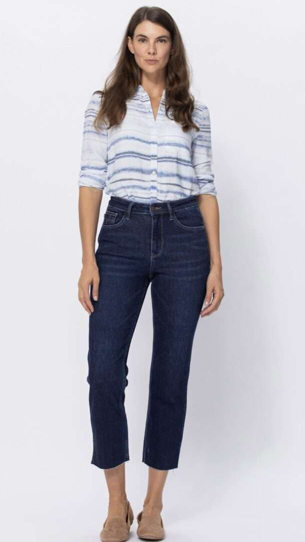 Model showcasing high-waisted Judy Blue Joannie jeans in dark wash, featuring a cropped straight fit.