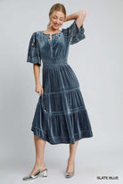 Slate blue floral lace contrast sleeve dress by Umgee, featuring velvet fabric and tiered midi design for an elegant look.