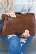 Chic Oversized Brown Vintage Clutch Bag - Shop Now! by Teal Tiger Boutique $24.00 Discover comfort, style, and trend with our 13 X 9 inch vintage clutch handbag. Perfect for your essentials, it's a must-have from our boutique collection. Teal Tiger Boutiq