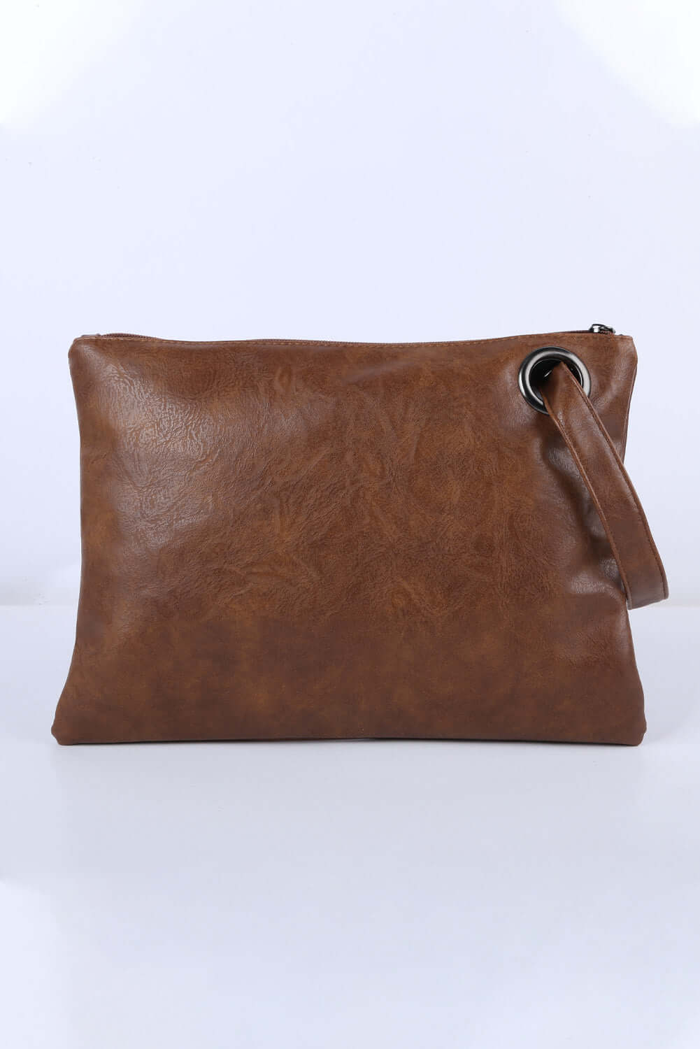 Chic Oversized Brown Vintage Clutch Bag - Shop Now! by Teal Tiger Boutique $24.00 Discover comfort, style, and trend with our 13 X 9 inch vintage clutch handbag. Perfect for your essentials, it's a must-have from our boutique collection. Teal Tiger Boutiq