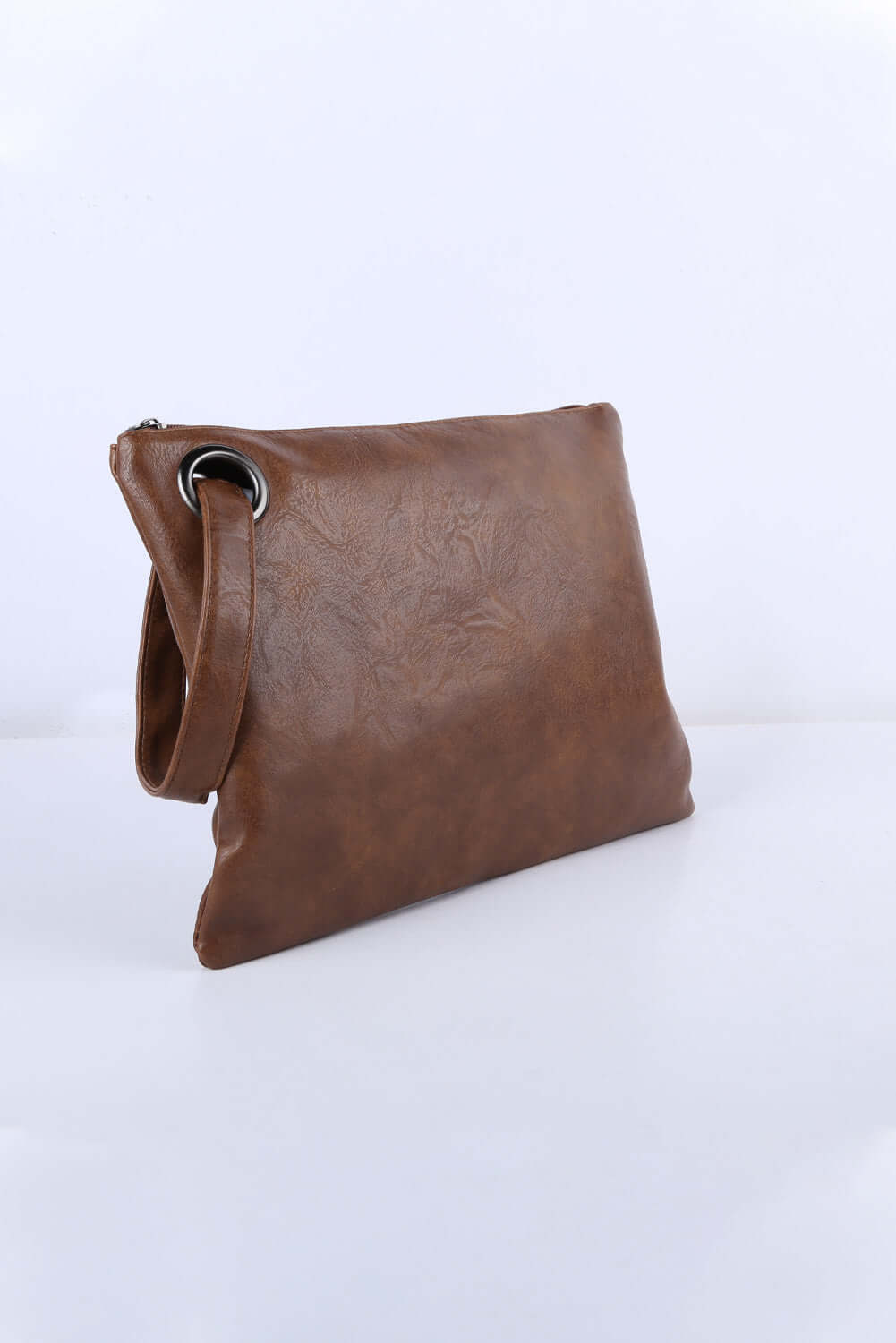 Chic Oversized Brown Vintage Clutch Bag - Shop Now! by Teal Tiger Boutique $24.00 Discover comfort, style, and trend with our 13 X 9 inch vintage clutch handbag. Perfect for your essentials, it's a must-have from our boutique collection. Teal Tiger Boutiq