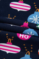 Close-up of festive decorations on fabric of BLUE CHRISTMAS WITHOUT YOU PJ's by Vivian-Lu, featuring vibrant ornament designs.