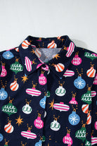 Blue pajamas top with festive holiday decoration designs, featuring buttons and collar.