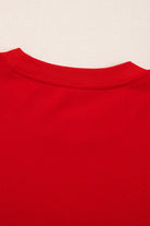 Close-up of red fleece-lined top from the SLEIGH GIRL SLEIGH PJ Set by Vivian-Lu, perfect for cozy holiday lounging.