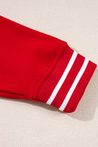 Red long-sleeve fleece lined top with striped cuff from the Sleigh Girl Sleigh PJ set by Vivian-Lu.