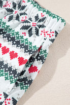 Festive holiday pajama shorts with snowflake and heart pattern, featuring a drawstring waist and pockets.