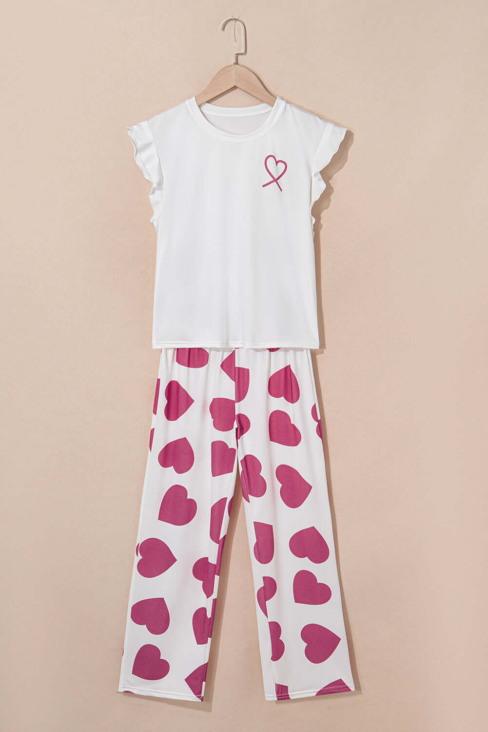 Cozy Love Language Lounge Set in pink featuring ruffled tank top and heart-print lounge pants.