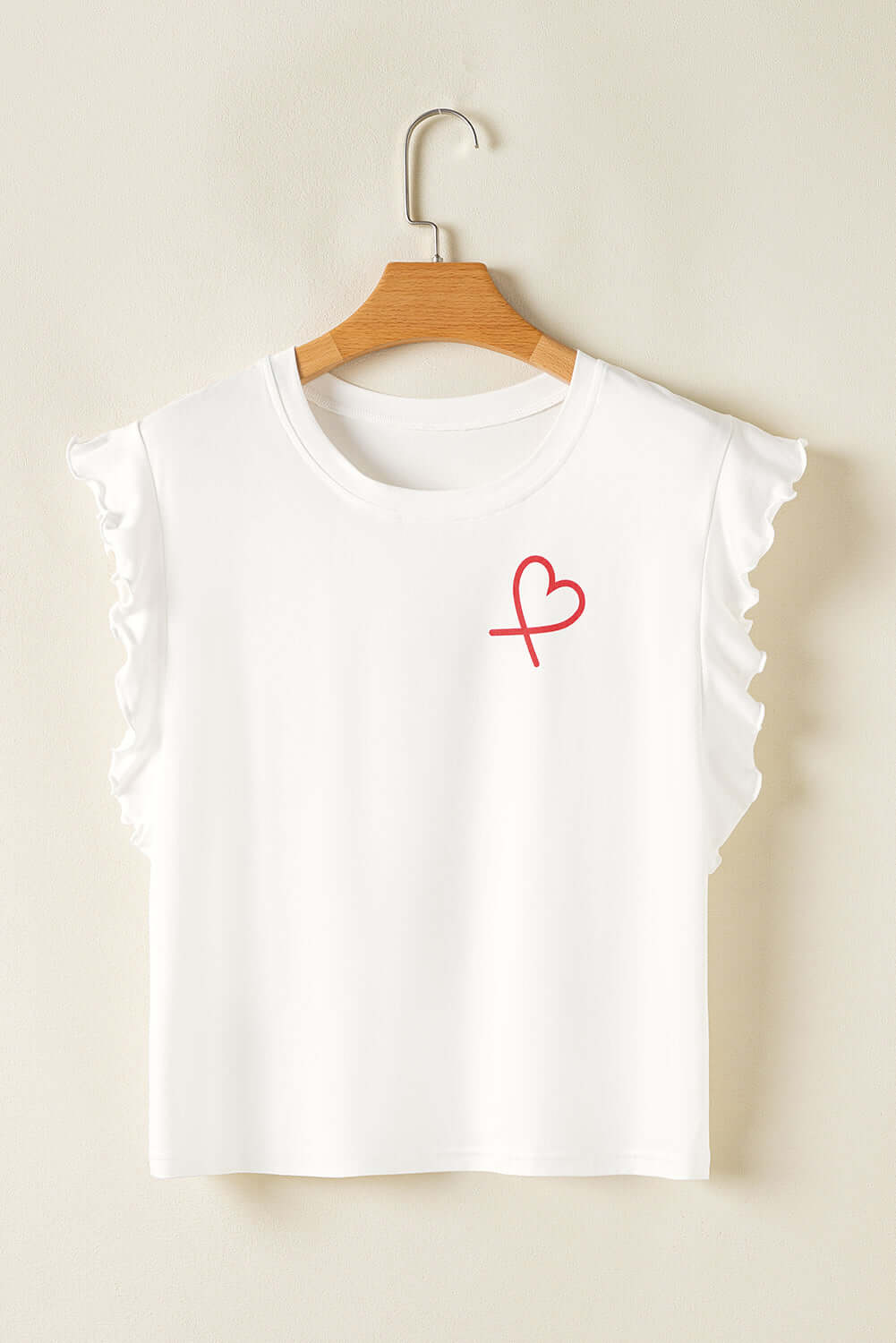 White ruffled sleeve t-shirt with red heart print on chest, perfect for casual and cozy outfits.