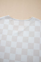 Back view of a relaxed-fit checkered V-neck top from the Weekend Check-In lounge set in neutral tones.