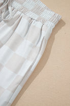 Close-up of soft drawstring shorts from the Weekend Check-In checkered two-piece lounge set.