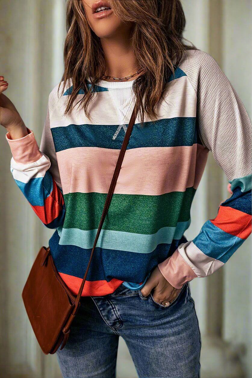 Color block long sleeve top from Vivian-Lu with round neck and raglan sleeves, styled for autumn fashion.