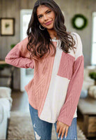 Cozy Contrasts Top with textured knit and color block design, perfect for cooler days and featuring a chest pocket.