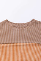 Taupe and tan color block top with ribbed texture and long sleeves, perfect for a chic and comfortable look in cooler weather.