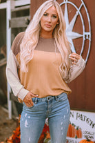 Woman wearing STANDOUT Color Block Top in taupe and tan with long sleeves and ribbed texture for a chic and comfortable look