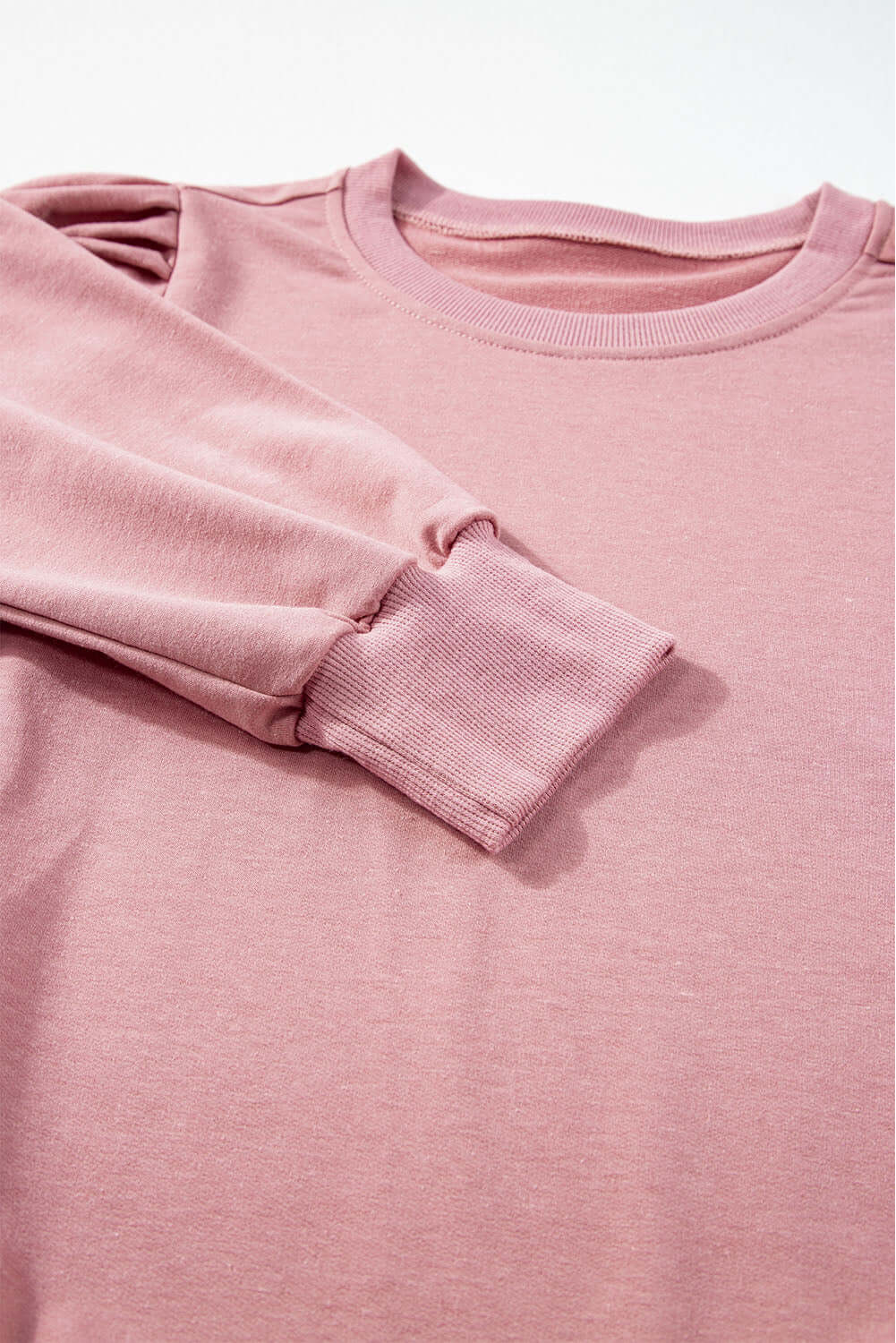 Pink Bishop Sleeve Top with Round Neck and Shift Cut, featuring Delicate Button-Tab Detail, Perfect for Fall and Winter Fashion.