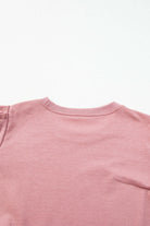 Pink "Rose by Any Other Name" top with elegant Bishop sleeves and round neck, ideal for fall fashion.