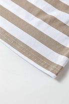 Close-up of the striped fabric edge of the INSPIRING JOURNEY top by Vivian-Lu, showcasing its stylish design and quality.