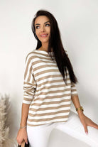 Stylish striped boatneck top by Vivian-Lu, perfect for a versatile and fashionable look. Pair it with solid pants for a chic outfit.