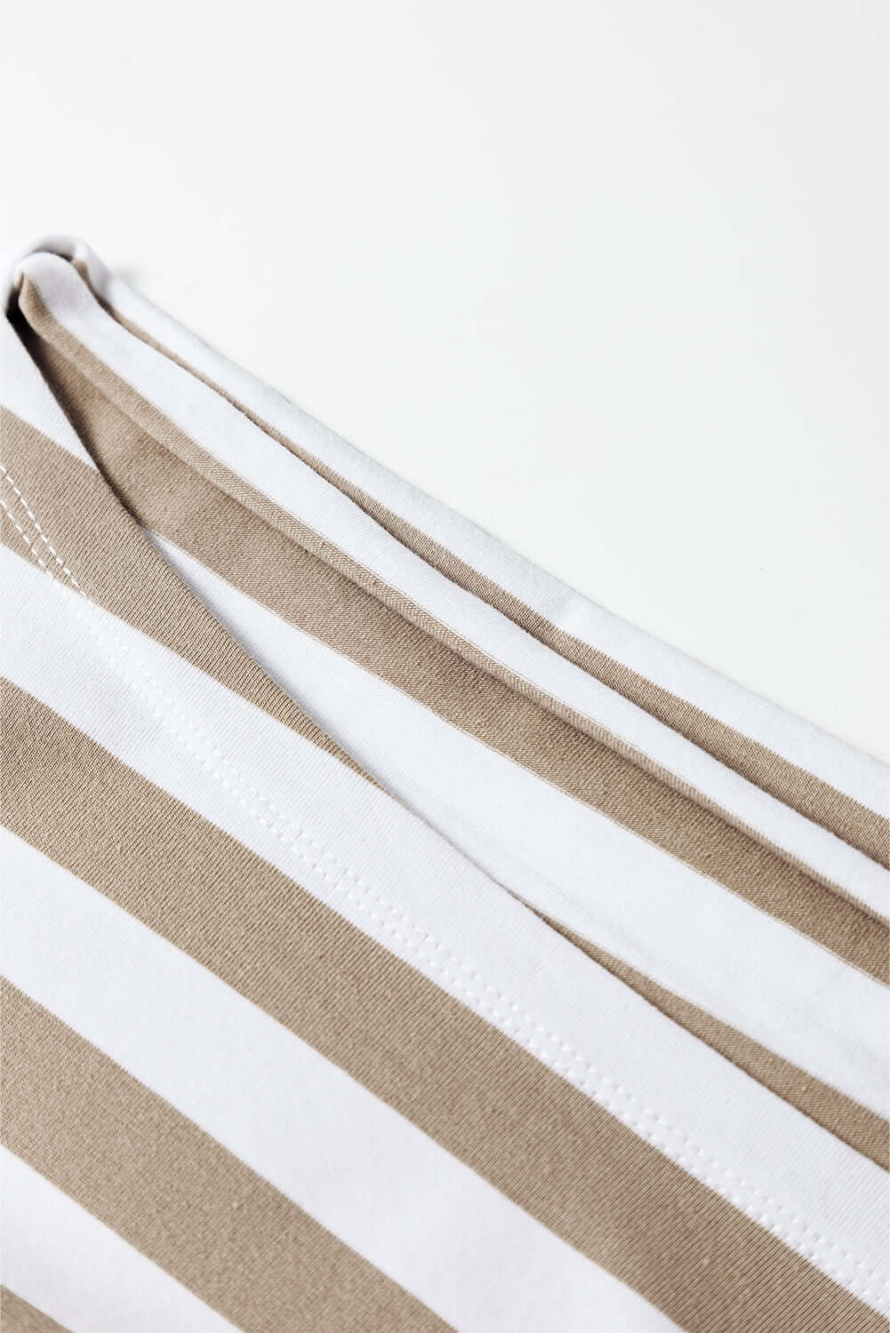 Striped design of the inspiring journey top by Vivian-Lu, showcasing soft, breathable fabric with a stylish boatneck.