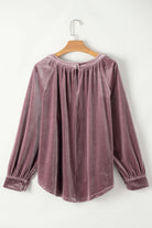 Lilac Luxe Top in soft velvet with long sleeves, pleated round neck, and keyhole back on hanger. Perfect elegant blouse for celebrations.