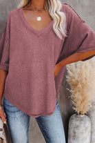 Carefree Mode Top in rosewood, featuring a relaxed fit and breathable textured knit, styled with jeans.