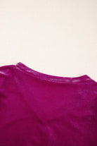 Raspberry Gemtone velvet top detail showing pleated texture and rich color.