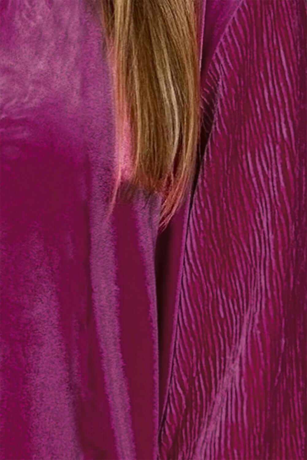 Raspberry Gemtone Top with velvet pleats and bubble sleeves, showcasing its vibrant color and luxurious texture.