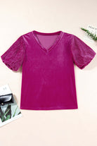 Raspberry Gemtone Top with V-neck, pleated bubble sleeves, and velvet texture, perfect for stylish, relaxed wear.