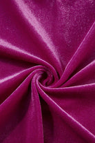 Luxurious raspberry velvet fabric texture with pleated design, highlighting the softness and richness of the material for the Gemtone Top.