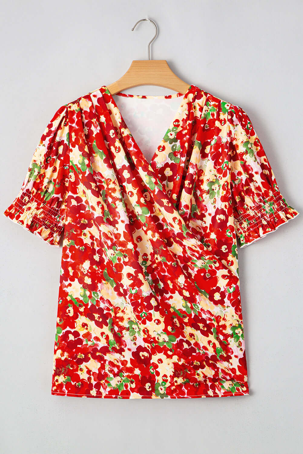 Tropical Tango red floral bubble sleeve blouse with V-neck design, perfect for summer styling.