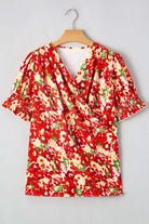 Tropical Tango red floral bubble sleeve blouse with V-neck design, perfect for summer styling.