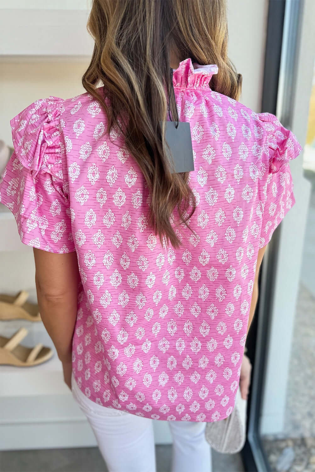 MIRROR IMAGE Top - Trendy Boutique Blouse Style & Comfort by Vivian-Lu $33.00 Embrace your daring side with this feminine pink floral blouse. Enjoy tiered ruffle sleeves, split neck, and chic tie accent. Perfect for trendsetters! Teal Tiger Boutique